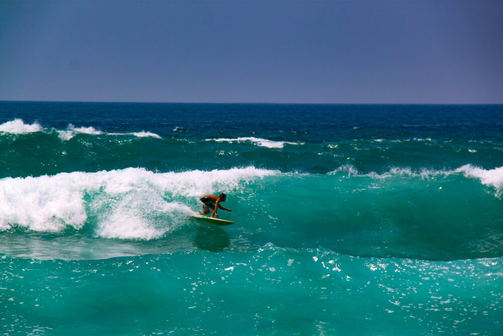 guy surfing in Sayulita