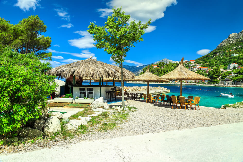 umbrellas and chairs on a beach near Brela Croatia