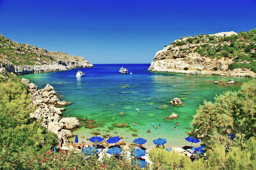 boats in a cove in Rhodes, Greece