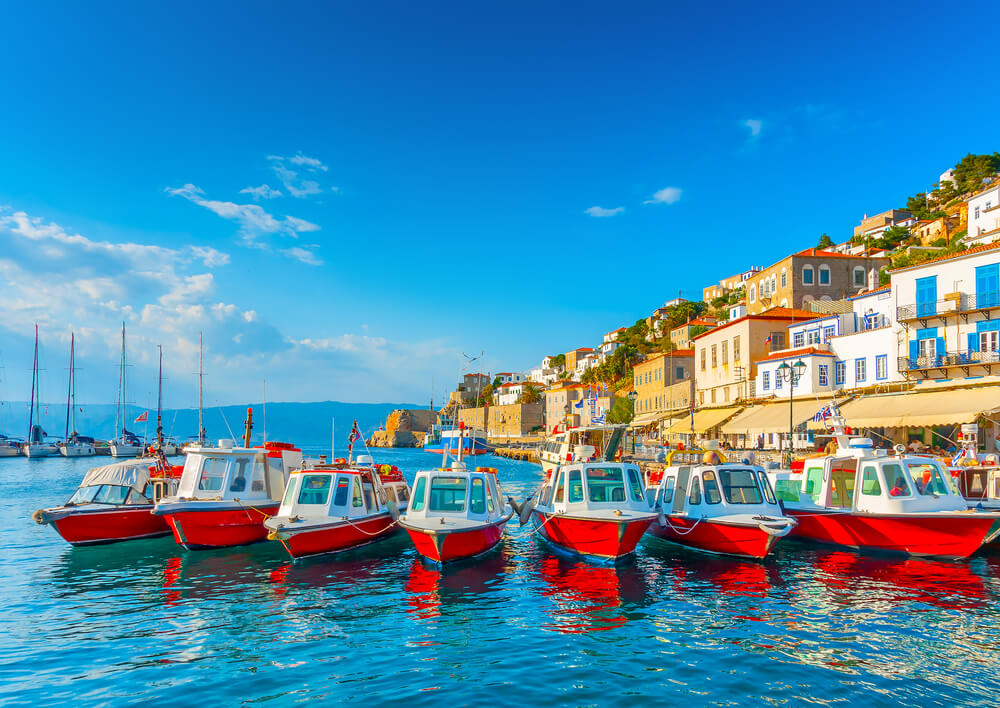 red and white taxi boats in Greece