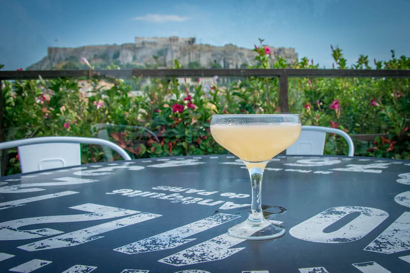 cocktail with a view in a rooftop bar in Athens
