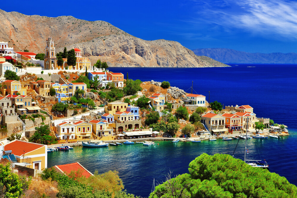 drone view of a Greek Island village and coastline