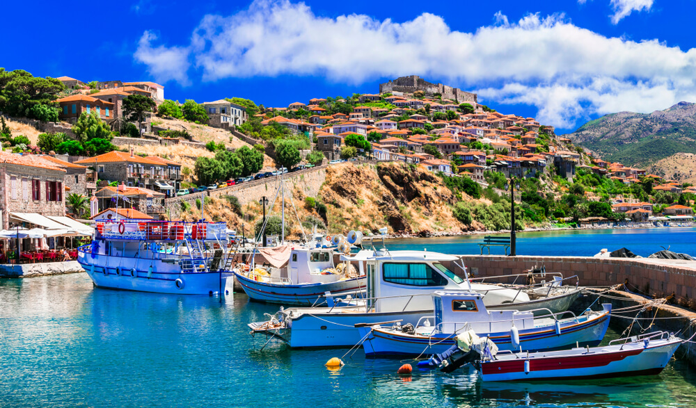 hill village and boats in the Greek Island of Lesbos