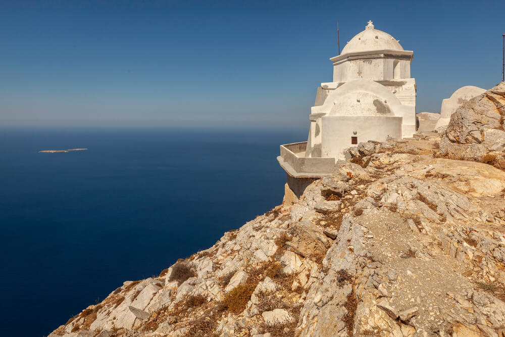 chapel hanging over a cliff on Anafi, near Santorini