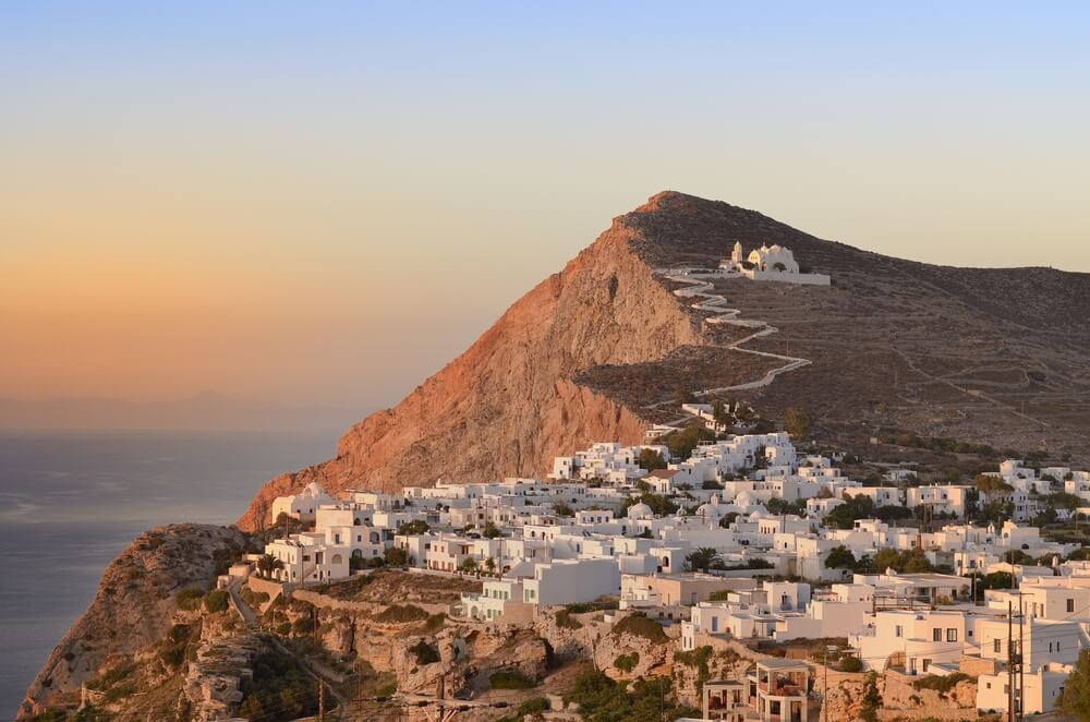 white village and chapel on mountain