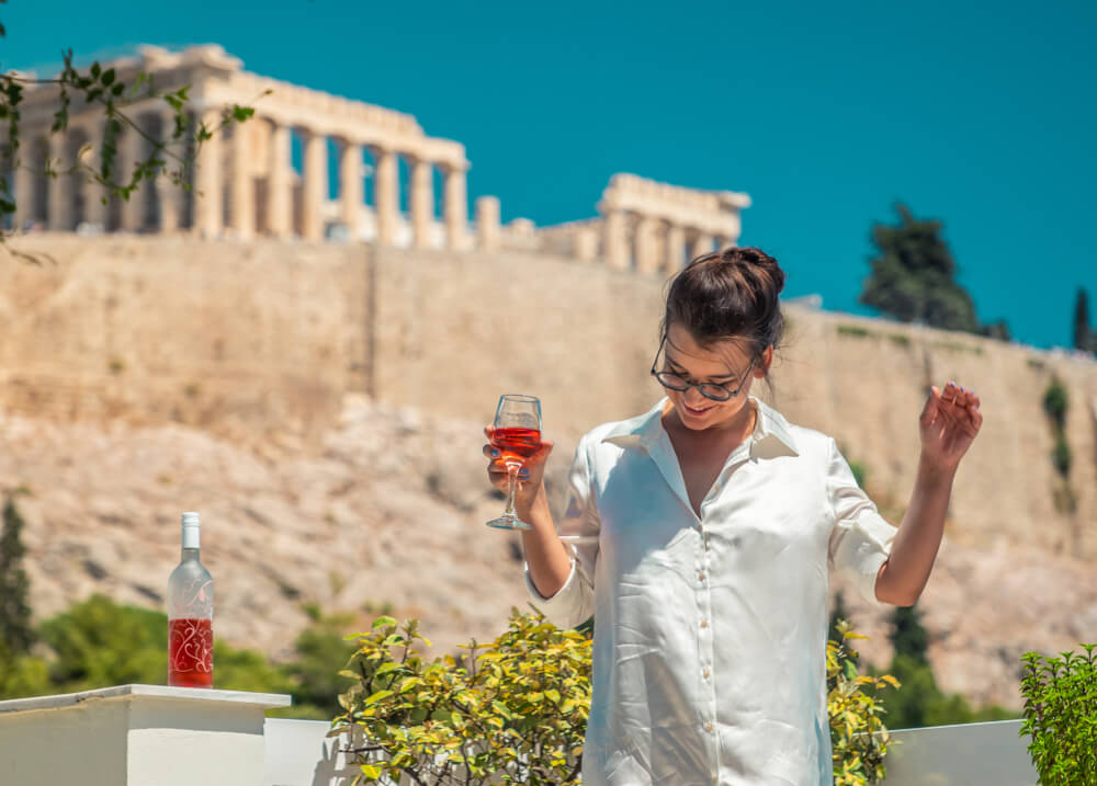 girl with wine in Athens