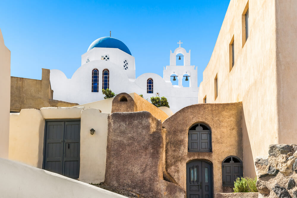 church and walls in an old village in Santorini