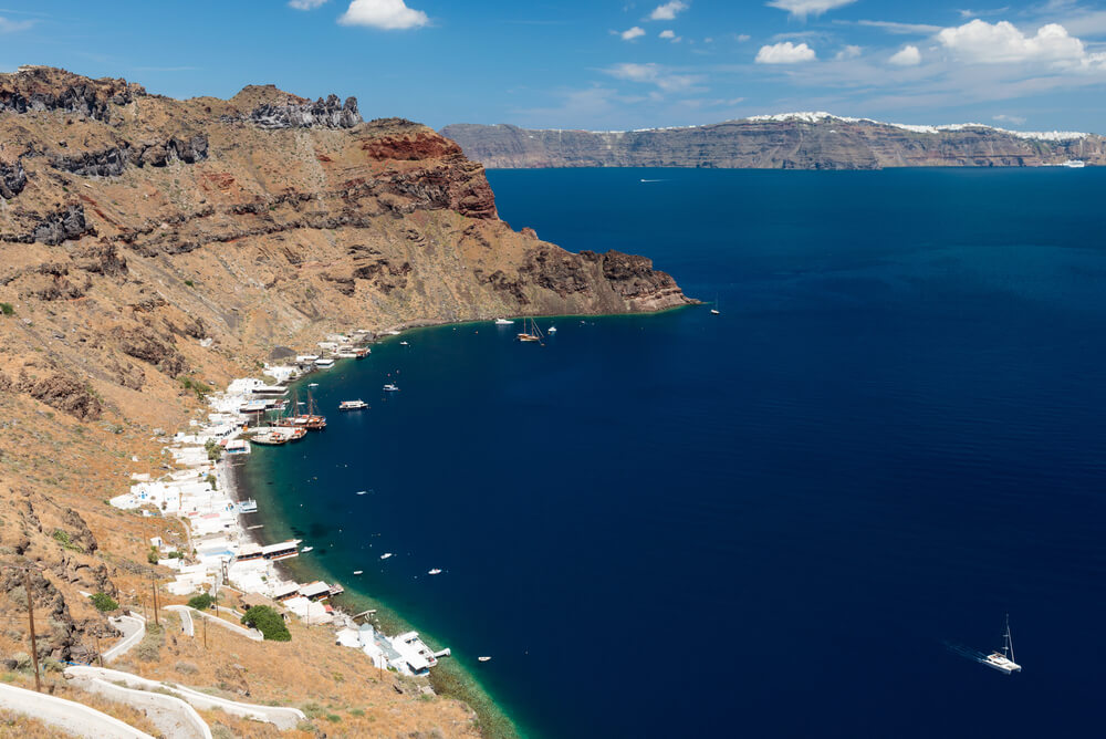 rugges coastline of Thirasia, the nearest island to Santorini