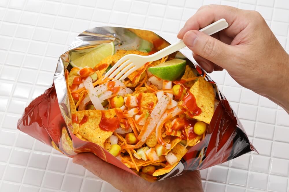 bag of doritos filled with toppings in Mexico