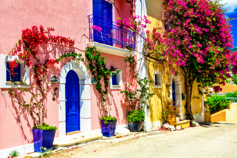 pink and yellow homes in Greece