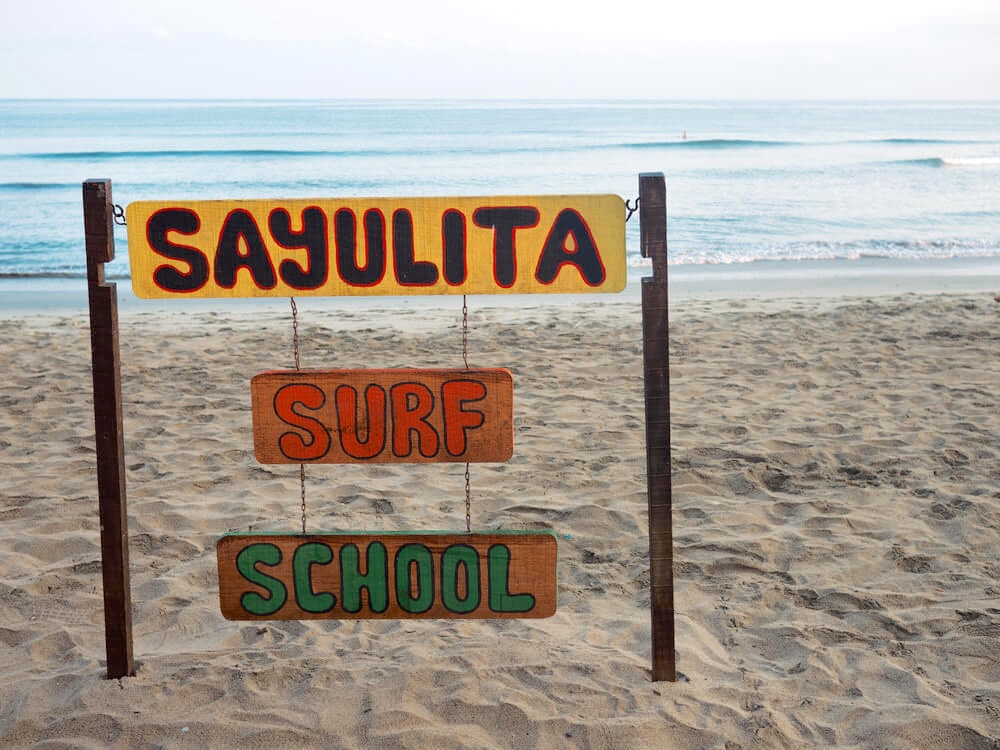 Sayulita beach surf school sign
