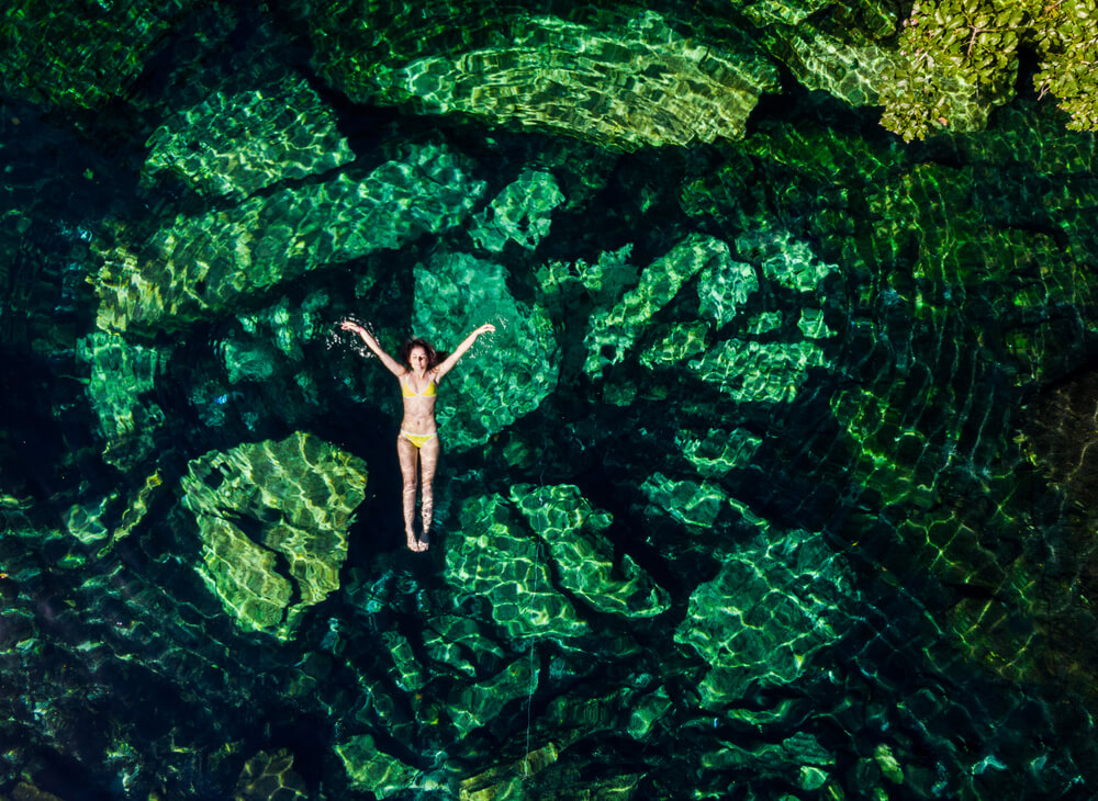 girl floating in ocean