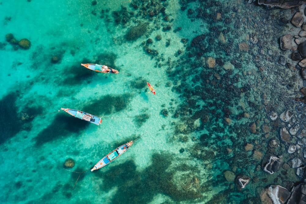 drone view of boats in Koh Tao Thailand