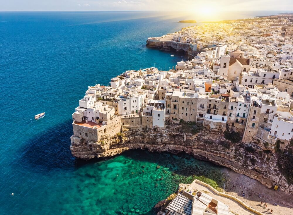 drone view of white town near the sea Italy