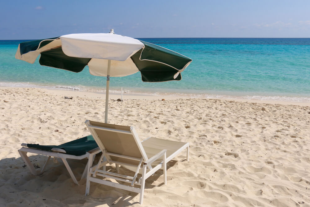 2 chaise loungers and umbrella on Playa San Martin, Cozumel