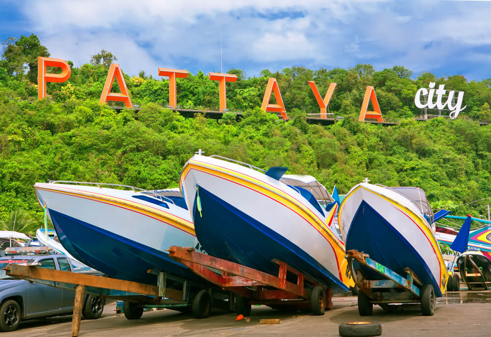 Pattaya City sign with 3 boats