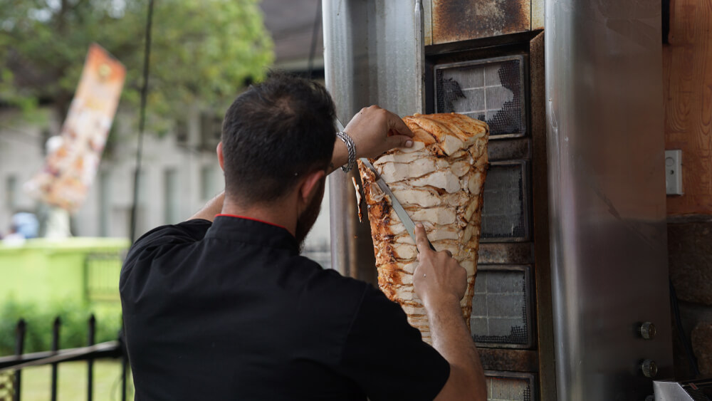 man cutting Shawarma in Egypt