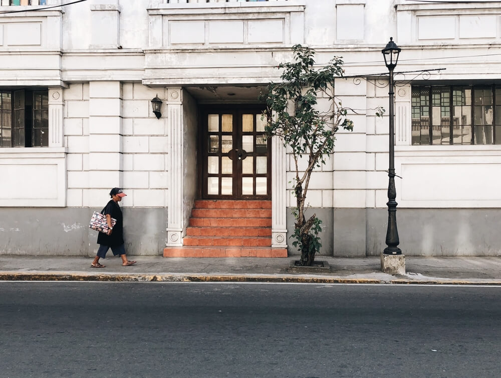 person walking in Intramuros, Manila