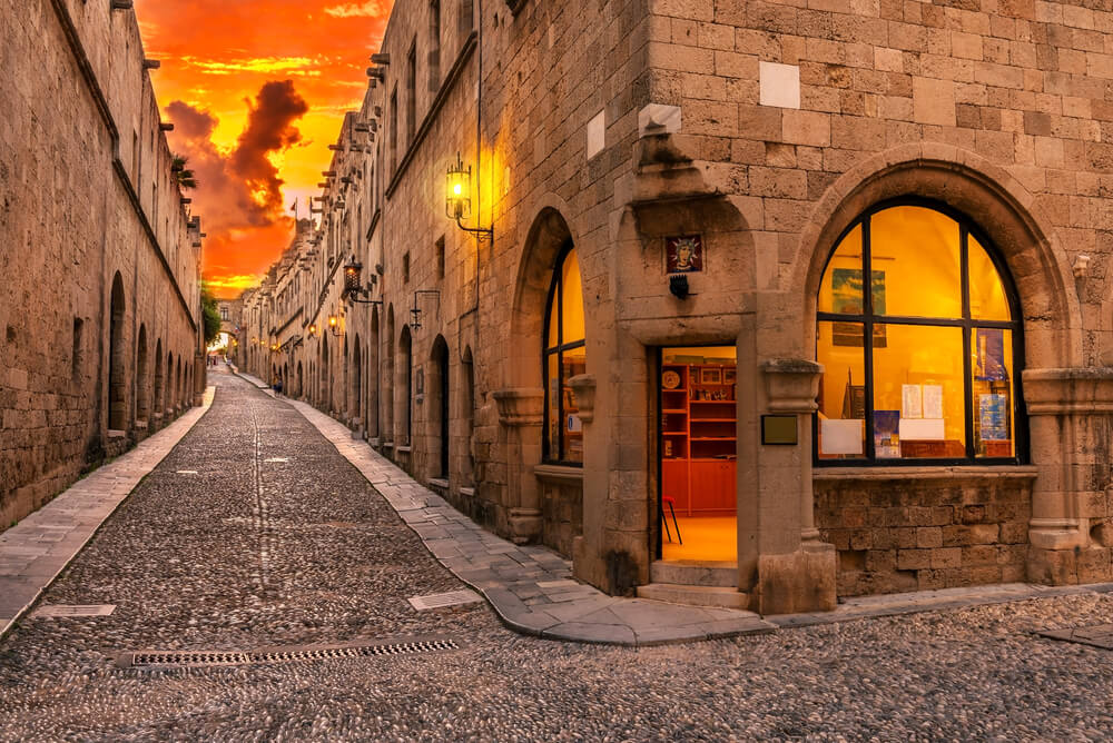 street in ancient Greece with orange sky