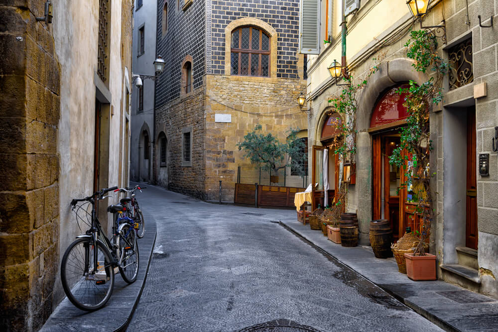 narrow street with bike in Italy