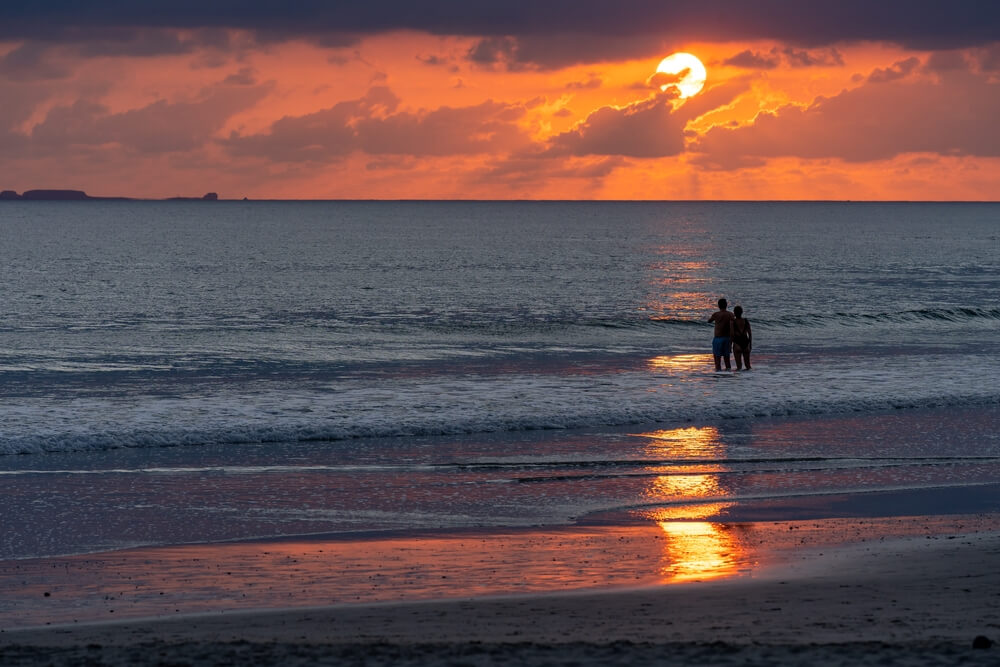 couple at the shore in Playa Punta Mita, Mexico